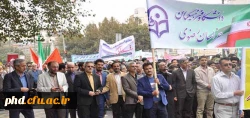 حضور پرشکوه کارکنان ودانشجو معلمان پردیس شهید هاشمی نژاد در راهپیمایی یوم الله 13 آبان